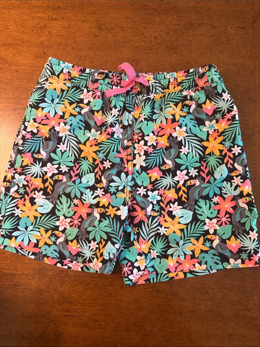 chubbies Kids Tropical Floral Swim Trunks in Black with Pink Drawstring